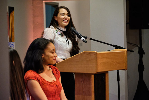 Student speaking at event